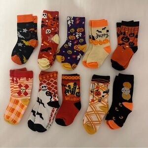 10 pairs of toddler Halloween socks.